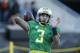 Oregon quarterback Vernon Adams, Jr., goes through warmups before of an NCAA college football game, in Eugene Ore., on Friday, Nov. 27, 2015. (AP Photo/Timothy J. Gonzalez)
