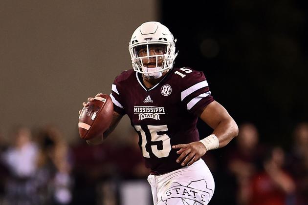 STARKVILLE, MS - NOVEMBER 28:  Dak Prescott #15 of the Mississippi State Bulldogs looks to pass during a game against the Mississippi Rebels at Davis Wade Stadium on November 28, 2015 in Starkville, Mississippi.  Mississippi defeated Mississippi State 38-27.  (Photo by Stacy Revere/Getty Images)