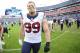 Dec 27, 2015; Nashville, TN, USA; Houston Texans defensive end J.J. Watt (99) after a win against the Tennessee Titans at Nissan Stadium. The Texans won 34-6. Mandatory Credit: Christopher Hanewinckel-USA TODAY Sports