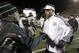 Texas A&M head coach Kevin Sumlin, right, meets Vanderbilt head coach Derek Mason on the field after an NCAA college football game Saturday, Nov. 21, 2015, in Nashville, Tenn. (AP Photo/Mark Humphrey)