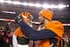 DENVER, CO - DECEMBER 28: Quarterback Brock Osweiler #17 of the Denver Broncos and quarterback AJ McCarron #5 of the Cincinnati Bengals shake hands on the field after the Broncos 20-17 overtime win at Sports Authority Field at Mile High on December 28, 2015 in Denver, Colorado. (Photo by Justin Edmonds/Getty Images)