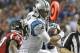 Carolina Panthers quarterback Cam Newton (1) runs against Atlanta Falcons free safety Ricardo Allen (37) during the second half of an NFL football game, Sunday, Dec. 27, 2015, in Atlanta. (AP Photo/David Goldman)