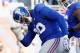 EAST RUTHERFORD, NJ - DECEMBER 20: Jason Pierre-Paul #90 of the New York Giants reacts against the Carolina Panthers during their game at MetLife Stadium on December 20, 2015 in East Rutherford, New Jersey. (Photo by Michael Reaves/Getty Images)