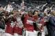 Alabama celebrates after the Cotton Bowl NCAA college football semifinal playoff game against Michigan State, Thursday, Dec. 31, 2015, in Arlington, Texas. Alabama won 38-0 to advance to the championship game. (AP Photo/Tony Gutierrez)