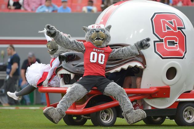 RALEIGH, NC - NOVEMBER 28:  North Carolina State Wolfpack mascots Mr. Wuf and Miss Wuf perform during their game against the North Carolina Tar Heels at Carter-Finley Stadium on November 28, 2015 in Raleigh, North Carolina. North Carolina won 45-34.  (Photo by Grant Halverson/Getty Images)