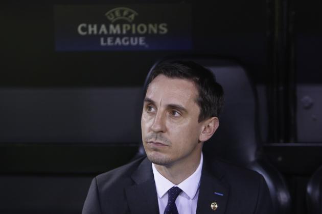 Valencia's head coach Gary Neville waits for  the start of a group H Champions League soccer match between Valencia and Lyon at the Mestalla stadium in Valencia, Spain, Wednesday Dec. 9, 2015. (AP Photo/Alberto Saiz)