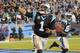 Carolina Panthers quarterback Cam Newton (1) celebrates a touchdown against the Tampa Bay Buccaneers in the first half of an NFL football game in Charlotte, N.C., Sunday, Jan. 3, 2016. (AP Photo/Mike McCarn)