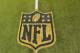 A general view of an NFL logo on the 50-yard line prior to an NFL football game between the Cleveland Browns and the Baltimore Ravens Monday, Nov. 30, 2015, in Cleveland. Baltimore won 33-27. (AP Photo/David Richard)