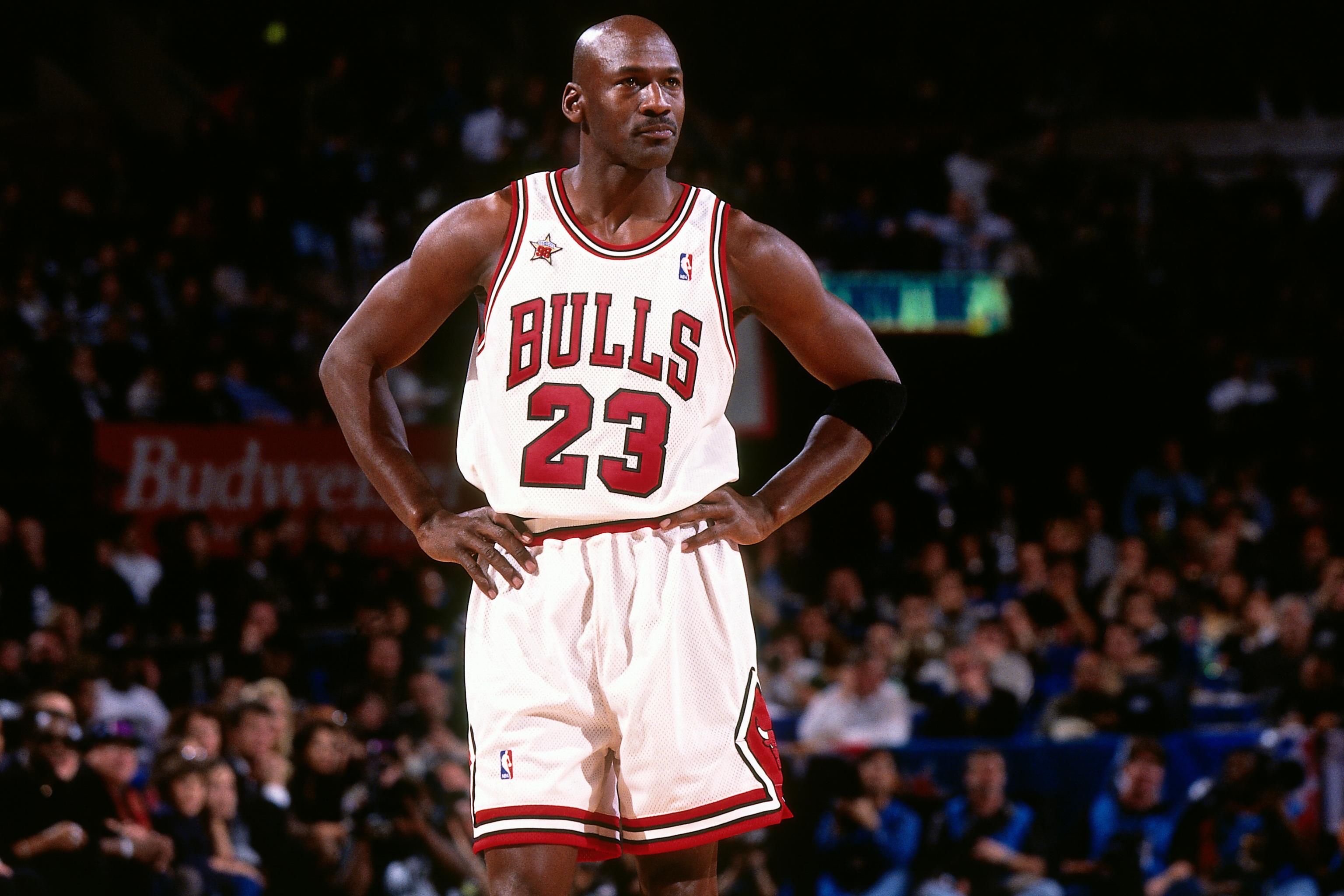 Why did Michael Jordan's jersey number change from 23 to 45 during his  second Chicago Bulls stint