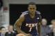 Penn's Tony Hicks (1) in action during an NCAA college basketball game with Villanova, Wednesday, Dec. 4, 2013, in Villanova. (AP Photo/Laurence Kesterson)