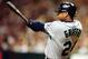 Seattle Mariners batter Ken Griffey Jr. connects for his 40th home run of the season off Tampa Bay Devil Rays pitcher Wilson Alvarez during the fourth inning Tuesday night, July 21, 1998 at Tropicana Field in St. Petersburg, Fla. (AP Photo/Steve Nesius)