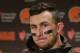 Cleveland Browns quarterback Johnny Manziel speaks with media members following the team's 30-13 loss to the Seattle Seahawks n an NFL football game, Sunday, Dec. 20, 2015, in Seattle. (AP Photo/Scott Eklund)