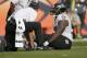 Baltimore Ravens outside linebacker Terrell Suggs is treated on the field during the second half of an NFL football game against the Denver Broncos Sunday, Sept. 13, 2015, in Denver. (AP Photo/Jack Dempsey)