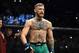 LAS VEGAS, NEVADA - DECEMBER 12: Conor McGregor of Ireland stands in his corner before facing Jose Aldo of Brazil in their featherweight championship bout during the UFC 194 event inside MGM Grand Garden Arena on December 12, 2015 in Las Vegas, Nevada. (Photo by Jeff Bottari/Zuffa LLC/Zuffa LLC via Getty Images)