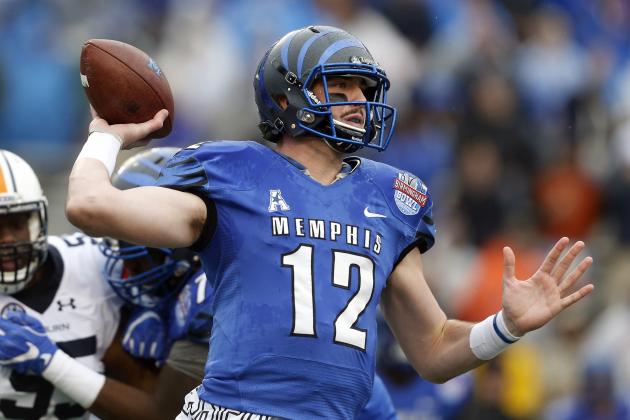 Memphis quarterback Paxton Lynch (12) throws a pass during the first half of the Birmingham Bowl NCAA college football game against Auburn Auburn, Wednesday, Dec. 30, 2015, in Birmingham, Ala. (AP Photo/Butch Dill)