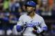 Los Angeles Dodgers shortstop Jimmy Rollins (11) reacts after striking out against the New York Mets during the first inning of baseball's Game 3 of the National League Division Series, Monday, Oct. 12, 2015, in New York. (AP Photo/Julie Jacobson)