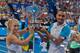Nick Kyrgios and Daria Gavrilova of the Australia Green team celebrate with the Hopman Cup after defeating Alexandr Dolgopolov and Elina Svitolina of Ukraine during their mixed doubles final match on day seven of the Hopman Cup tennis tournament in Perth on January 9, 2016. AFP PHOTO / Tony ASHBY
-IMAGE RESTRICTED TO EDITORIAL USE - NO COMMERCIAL USE / AFP / TONY ASHBY (Photo credit should read TONY ASHBY/AFP/Getty Images)