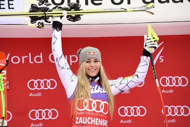 Lindsey Vonn, of the United States, celebrates on the podium after winning an alpine ski, women's World Cup downhill, in Altenmarkt-Zauchensee, Austria, Saturday, Jan 9, 2016. (AP Photo/Pier Marco Tacca)
