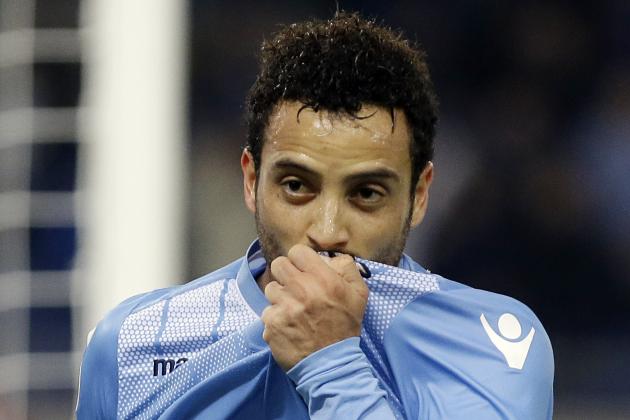 Lazio's Felipe Anderson celebrates by kissing his jersey after scoring during a Serie A soccer match between Lazio and Torino in Rome's Olympic stadium, Sunday, Oct. 25, 2015. (AP Photo/Gregorio Borgia)