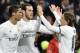Real Madrid's Welsh forward Gareth Bale (C) is congratulated by Real Madrid's Portuguese forward Cristiano Ronaldo (L) and Real Madrid's Croatian midfielder Luka Modric after scoring during the Spanish league football match Real Madrid CF vs RC Deportivo La Coruna at the Santiago Bernabeu stadium in Madrid on January 9, 2016. AFP PHOTO / GERARD JULIEN / AFP / GERARD JULIEN (Photo credit should read GERARD JULIEN/AFP/Getty Images)