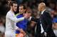 MADRID, SPAIN - JANUARY 09: Hat trick scorer Gareth Bale of Real Madrid shakes hands with Zinedine Zidane manager of Real Madrid as he is substituted during the La Liga match between Real Madrid CF and RC Deportivo La Coruna at Estadio Santiago Bernabeu on January 9, 2016 in Madrid, Spain. (Photo by Denis Doyle/Getty Images)