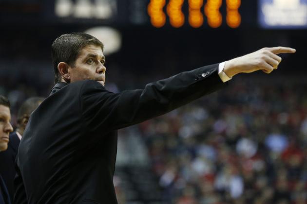 UNLV head coach Dave Rice motions to his players during the first half of an NCAA college basketball game against Arizona State Wednesday, Dec. 16, 2015, in Las Vegas. (AP Photo/John Locher)
