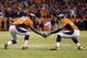 Denver Broncos running back Ronnie Hillman, left, celebrates after scoring with C.J. Anderson during the second half in an NFL football game against the San Diego Chargers, Sunday, Jan. 3, 2016, in Denver. (AP Photo/Jack Dempsey)
