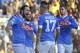 Napoli's Gonzalo Higuain, left, celebrates with his teammates after he scored on a penalty kick during a Serie A soccer match between Frosinone and Napoli, in Frosinone, Italy, Sunday, Jan. 10, 2016. (Ettore Ferrari/ANSA via AP)