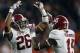 Alabama defensive back Marlon Humphrey (26) celebrates with defensive back Ronnie Harrison (15) after recovering an onside kick during the second half the NCAA college football playoff championship game against Clemson, Monday, Jan. 11, 2016, in Glendale, Ariz. Alabama won 45-40. (AP Photo/Butch Dill)