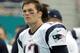 New England Patriots quarterback Tom Brady (12) watches a replay during the second half of an NFL football game against the Miami Dolphins, Sunday, Jan. 3, 2016, in Miami Gardens, Fla. (AP Photo/Lynne Sladky)