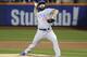 Chicago Cubs pitcher Jake Arrieta throws during the first inning of Game 2 of the National League baseball championship series against the New York Mets Sunday, Oct. 18, 2015, in New York. (AP Photo/Julie Jacobson)