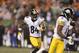 Pittsburgh Steelers wide receiver Antonio Brown (84) runs after a catch against the Cincinnati Bengals during the second half of an NFL wild-card playoff football game Saturday, Jan. 9, 2016, in Cincinnati. (AP Photo/Gary Landers)