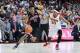 LOS ANGELES, CA - JANUARY 09: Allonzo Trier #11 of the Arizona Wildcats handles the ball against Elijah Stewart #30 of the USC Trojans in a USC 4OT win 101-103 during a NCAA Pac12 college basketball game at Galen Center on January 9, 2016 in Los Angeles, California. (Photo by Leon Bennett/Getty Images)