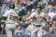 MILWAUKEE, WI - MAY 26: Hunter Pence #8 of the San Francisco Giants celebrates with Buster Posey #28 after hitting a solo home run in the first inning against the Milwaukee Brewers at Miller Park on May 26, 2015 in Milwaukee, Wisconsin. (Photo by Mike McGinnis/Getty Images)
