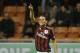 AC Milan's Carlos Bacca celebrates after scoring during the Italian Cup soccer match between AC Milan and Carpi at the San Siro stadium in Milan, Italy, Wednesday, Jan. 13, 2016. (AP Photo/Antonio Calanni)