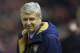 Arsenal's manager Arsene Wenger takes to the touchline before his team's English Premier League soccer match between Liverpool and Arsenal at Anfield Stadium, Liverpool, England, Wednesday, Jan. 13, 2016. (AP Photo/Jon Super)