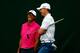 SCOTTSDALE, AZ - JANUARY 29: Tiger Woods and Jordan Spieth talk together on the 17th hole during the first round of the Waste Management Phoenix Open at TPC Scottsdale on January 29, 2015 in Scottsdale, Arizona. (Photo by Sam Greenwood/Getty Images)