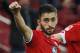 Mainz' Yunus Malli celebrates his side's second goal during a German Bundesliga soccer match between FSV Mainz 05 and VfL Wolfsburg in Mainz, Germany, Saturday, Nov. 7, 2015. (AP Photo/Michael Probst)