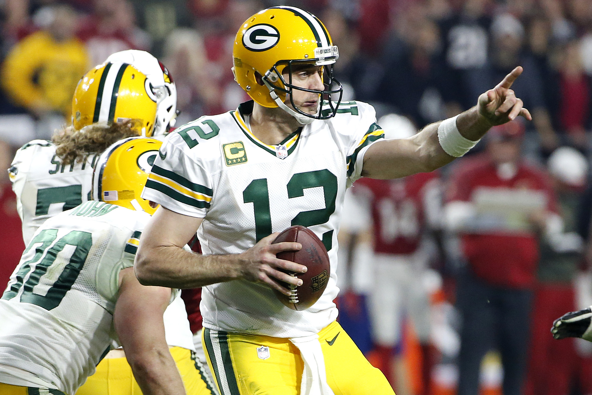 Aaron Rodgers' late heroics lift Packers over Dolphins