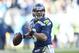 Jan 17, 2016; Charlotte, NC, USA; Seattle Seahawks quarterback Russell Wilson (3) looks to pass during the fourth quarter against the Carolina Panthers in a NFC Divisional round playoff game at Bank of America Stadium. Mandatory Credit: John David Mercer-USA TODAY Sports