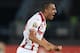 Tunisia's forward Ahmed Akaichi celebrates after scoring a goal during the 2015 African Cup of Nations quarter-final football match between Equatorial Guinea and Tunisia in Bata on January 31, 2015. AFP PHOTO / CARL DE SOUZA (Photo credit should read CARL DE SOUZA/AFP/Getty Images)