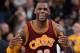 Cleveland Cavaliers forward LeBron James gestures to the Cleveland bench during the second half of an NBA basketball game against the San Antonio Spurs, Thursday, Jan. 14, 2016, in San Antonio. San Antonio won 99-95. (AP Photo/Darren Abate)