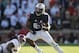 Auburn running back Peyton Barber (25) runs the ball against Alabama defensive lineman D.J. Pettway (57) during an NCAA college football game, Saturday, Nov. 28, 2015, in Auburn, Ala. (AP Photo/Gerald Herbert)