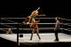 WWE wrestler Summer Rae, left, jumps over Charlotte during WWE Live India Tour, in New Delhi, Friday, Jan. 15, 2016. WWE returned to Indian after a gap of 13 years to entertain their fans. (AP Photo/Manish Swarup)