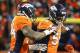 Denver Broncos outside linebacker DeMarcus Ware, left, celebrates after recoveing a fumble with outside linebacker Von Miller during the second half in an NFL football divisional playoff game against the Pittsburgh Steelers, Sunday, Jan. 17, 2016, in Denver. (AP Photo/Jack Dempsey)