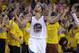 FILE - In this May 13, 2015, file photo, fans cheer as Golden State Warriors guard Stephen Curry (30) reacts after scoring during the first half of Game 5 in a second-round NBA playoff basketball series against the Memphis Grizzlies in Oakland, Calif. Curry has been named The Associated Press 2015 Male Athlete of the Year. (AP Photo/Ben Margot, File)