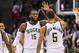 Dec 7, 2015; Milwaukee, WI, USA; Milwaukee Bucks center Greg Monroe (15) and guard Michael Carter-Williams (5) celebrate following a basket during the fourth quarter against the Portland Trail Blazers at BMO Harris Bradley Center. Milwaukee won 90-88. Mandatory Credit: Jeff Hanisch-USA TODAY Sports