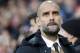 FILE - In this Saturday, Dec. 19, 2015 file photo, Bayern head coach Pep Guardiola arrives for the German Bundesliga soccer match between Hannover 96 and FC Bayern Munich in Hannover, Germany. Pep Guardiola says he wants to coach in the English Premier League when he leaves Bayern Munich at the end of this season, but hasn't yet signed a contract with a club. Guardiola, who opted not to extend his three-year contract at Bayern, said on Tuesday, Jan. 5, 2016
