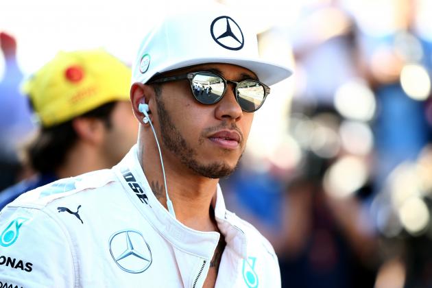 ABU DHABI, UNITED ARAB EMIRATES - NOVEMBER 29:  Lewis Hamilton of Great Britain and Mercedes GP walks to the drivers' parade before the Abu Dhabi Formula One Grand Prix at Yas Marina Circuit on November 29, 2015 in Abu Dhabi, United Arab Emirates.  (Photo by Mark Thompson/Getty Images)