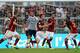 ROME, ITALY - AUGUST 30: Miralem Pjanic (C) with his teammates of AS Roma celebrates after scoring the opening goal during the Serie A match between AS Roma and Juventus FC at Stadio Olimpico on August 30, 2015 in Rome, Italy. (Photo by Paolo Bruno/Getty Images)